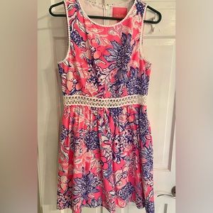 Lily Pulitzer hot pink patterned dress with cross cross see through waist